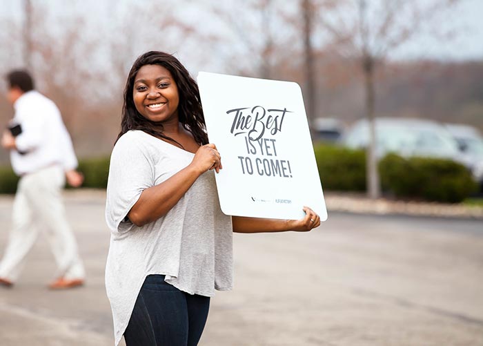 20171031-about-bodyimage-student-with-welcome-sign