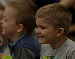 20220603-childrens-buttonimage-kids-smiling-floor