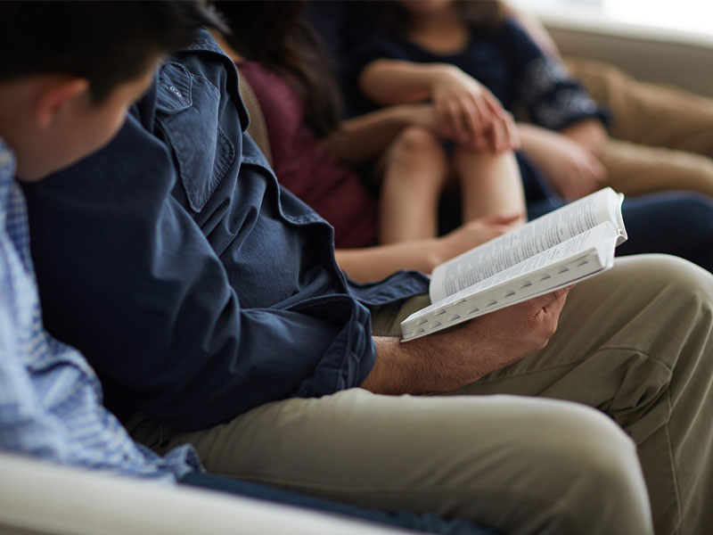 Family having devotional time together