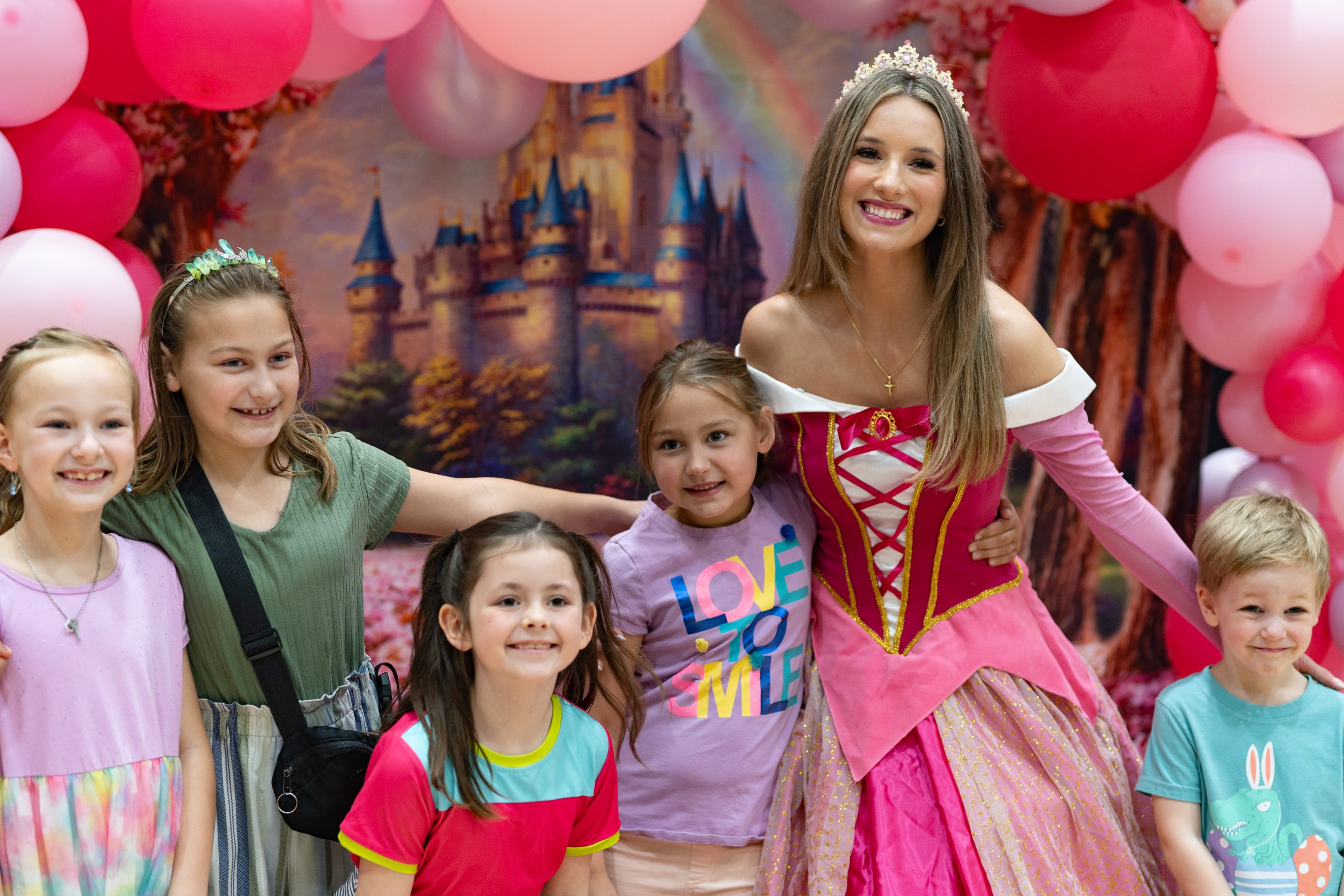 Young girl with costumed character 