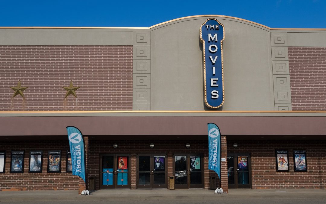 Movies-at-Meadville-entrance-with-Victory-flags